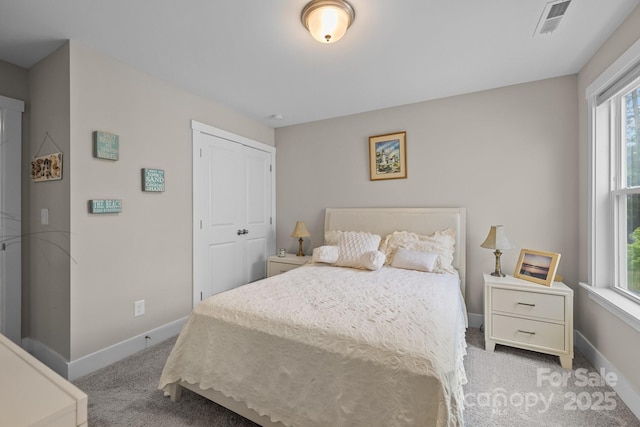 1548 Striped Bass Ln, Clover, SC 29710 - bedroom with baseboards, multiple windows, and light carpet