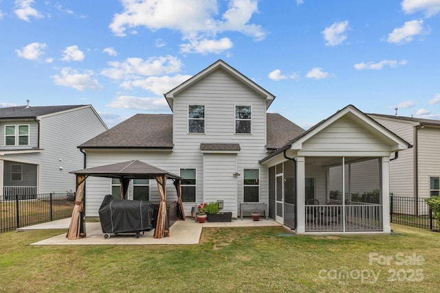 1548 Striped Bass Ln, Clover, SC 29710 - back of property featuring a patio area, a sunroom, a gazebo, fence, and a shingled roof