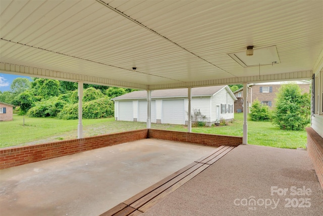 543 18th St NW, Hickory, NC 28601 - view of patio / terrace with an outdoor structure and a detached garage