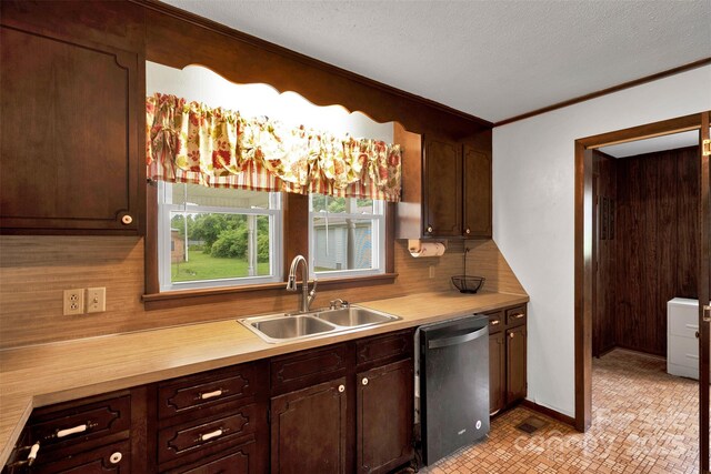 543 18th St NW, Hickory, NC 28601 - kitchen featuring stainless steel dishwasher, a sink, light countertops, ornamental molding, and backsplash