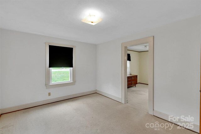 543 18th St NW, Hickory, NC 28601 - spare room with carpet flooring and baseboards