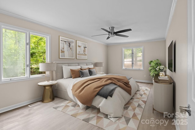 2701 Wimbledon Dr, Gastonia, NC 28056 - bedroom featuring multiple windows, crown molding, light wood-style floors, and a ceiling fan
