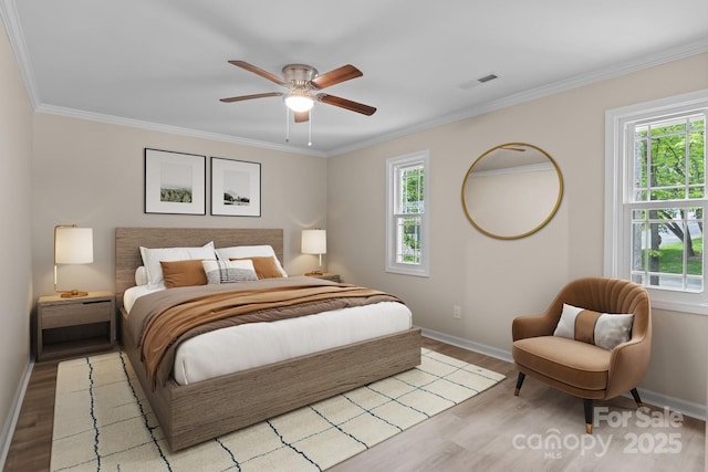 2701 Wimbledon Dr, Gastonia, NC 28056 - bedroom with multiple windows, light wood-style floors, crown molding, and a ceiling fan