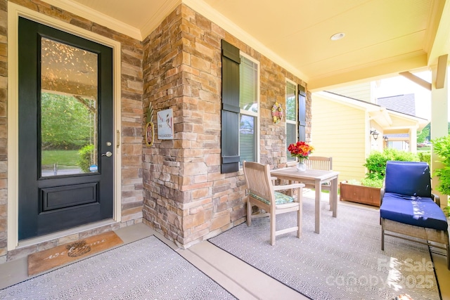 doorway to property with a porch