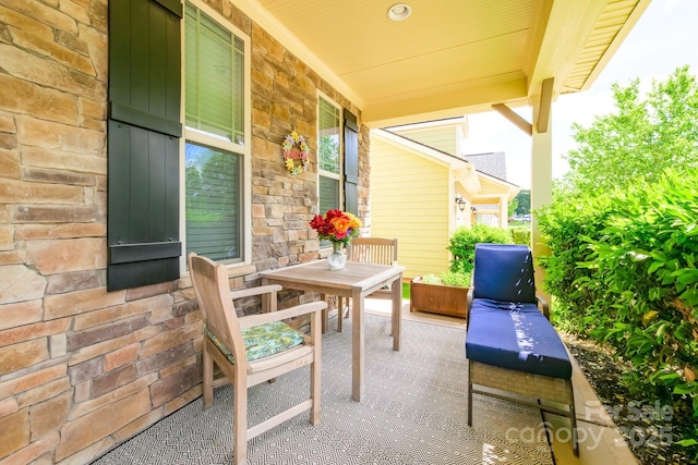 balcony featuring a porch