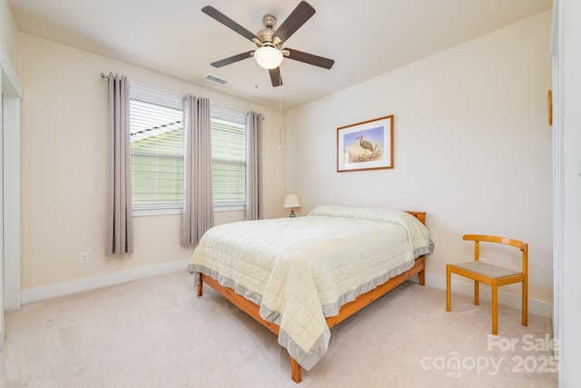 bedroom with carpet, baseboards, and ceiling fan