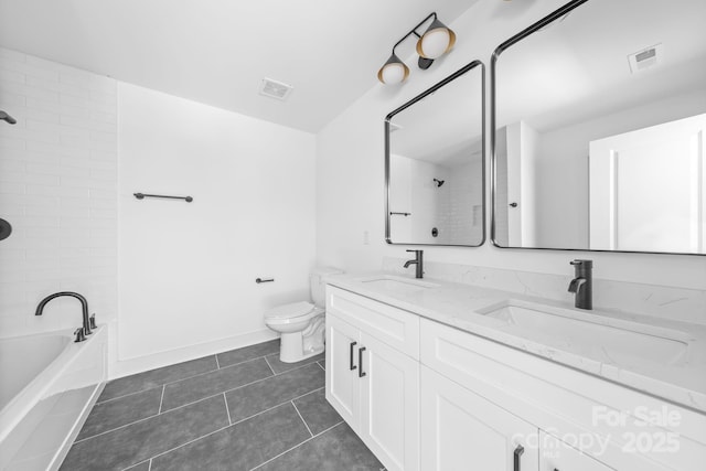bathroom with toilet, a sink, and visible vents