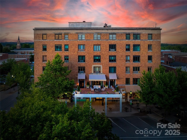 view of property at dusk
