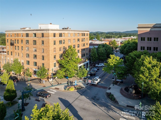 view of building exterior featuring a mountain view