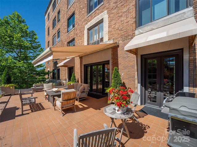 view of patio / terrace featuring outdoor lounge area and french doors