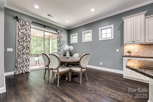 618 Chase Ct, Fort Mill, SC 29708 - dining area with dark wood-style floors, baseboards, recessed lighting, and ornamental molding