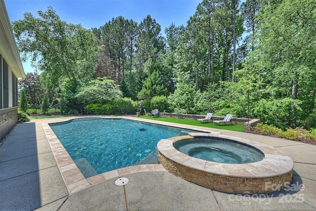 view of pool with a pool with connected hot tub and a patio area