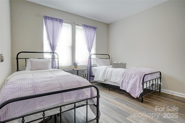 809 Fisher St, Concord, NC 28027 - bedroom featuring wood finished floors and baseboards