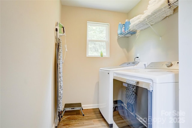 809 Fisher St, Concord, NC 28027 - laundry room with washer and clothes dryer and wood finished floors