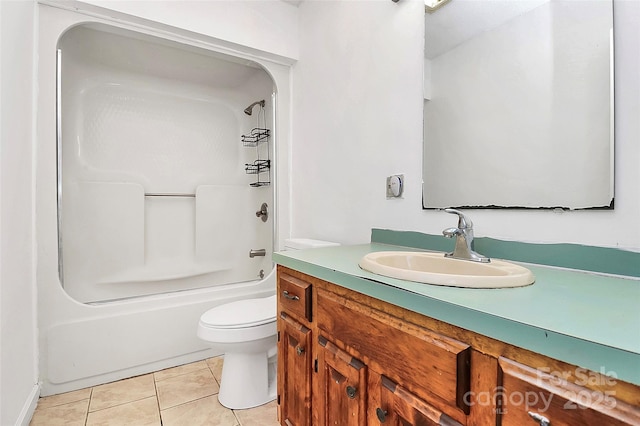 full bathroom featuring tile patterned flooring, toilet, bathtub / shower combination, and vanity