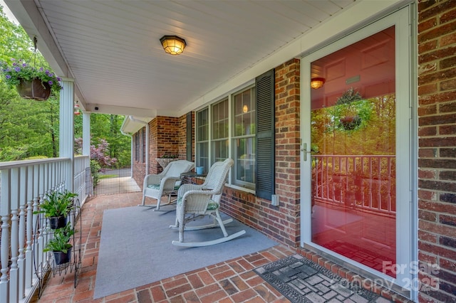 view of patio featuring covered porch