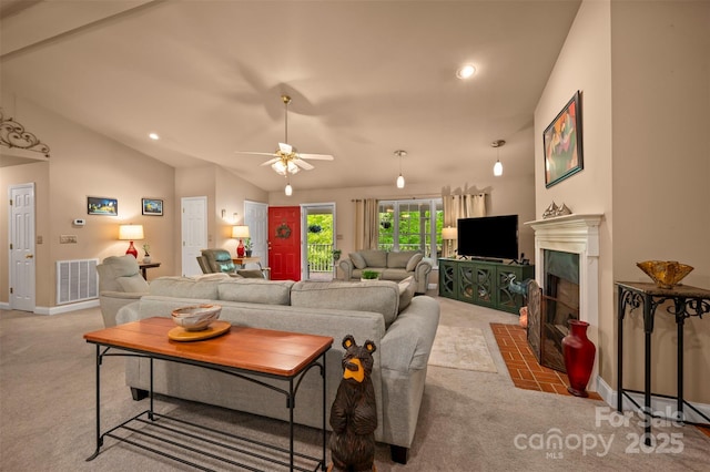carpeted living area featuring a fireplace, a ceiling fan, recessed lighting, vaulted ceiling, and visible vents