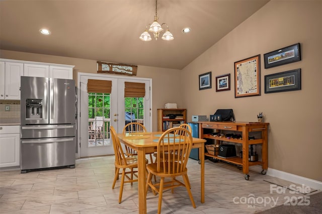 dining room featuring recessed lighting, french doors, marble finish floor, and lofted ceiling