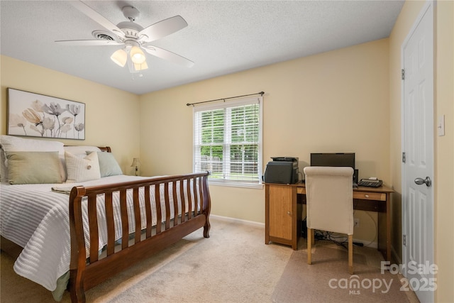 bedroom with baseboards, a ceiling fan, and light carpet