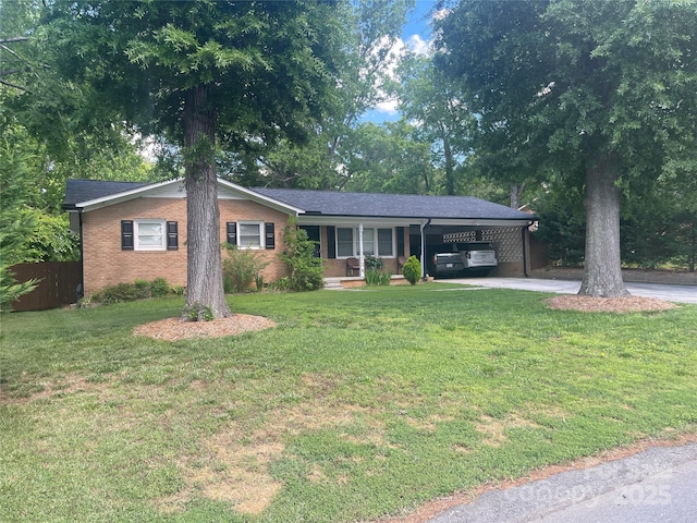 single story home with a carport, brick siding, driveway, and a porch