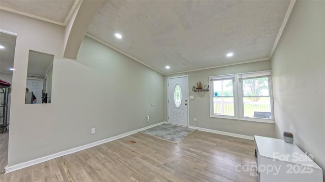 8140 Karriker Rd, Kannapolis, NC 28081 - foyer entrance featuring ornamental molding, wood finished floors, recessed lighting, and baseboards