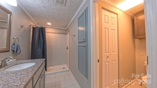 8140 Karriker Rd, Kannapolis, NC 28081 - full bath featuring a textured ceiling, vanity, a tile shower, crown molding, and tile patterned floors