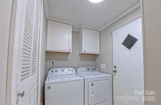 8140 Karriker Rd, Kannapolis, NC 28081 - laundry area with washing machine and clothes dryer and cabinet space