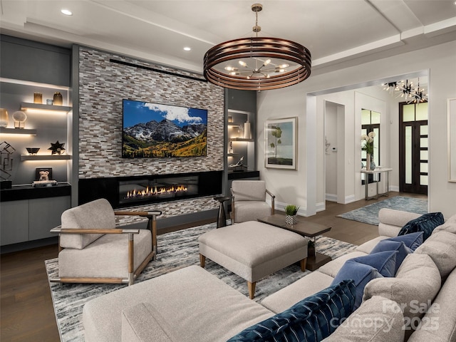 60 Running Creek Trl, Arden, NC 28704 - living area featuring a chandelier, wood finished floors, recessed lighting, baseboards, and a stone fireplace