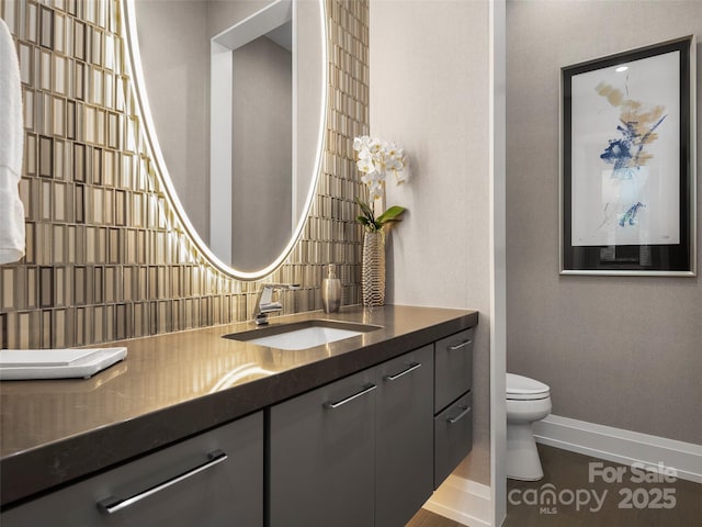 60 Running Creek Trl, Arden, NC 28704 - bathroom with baseboards, toilet, and vanity
