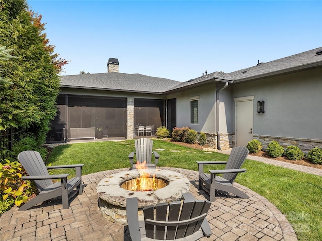 60 Running Creek Trl, Arden, NC 28704 - view of patio featuring an outdoor fire pit and a sunroom