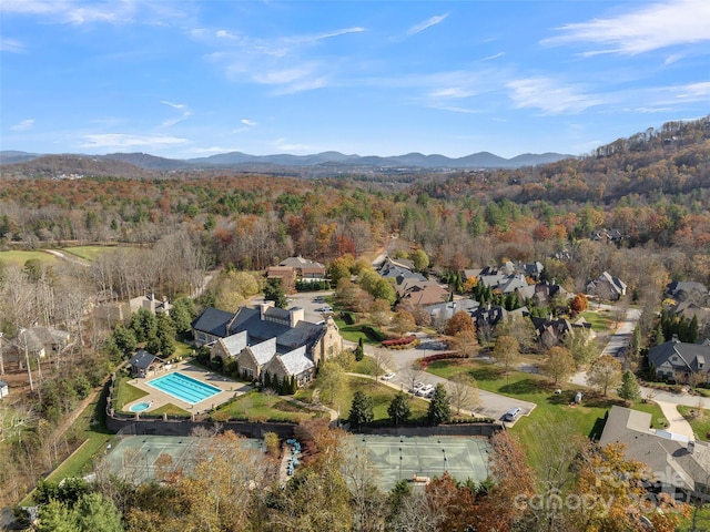 60 Running Creek Trl, Arden, NC 28704 - aerial view of property's location with a heavily wooded area, a pool area, and mountains