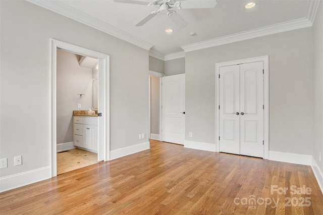 unfurnished bedroom with recessed lighting, light wood-style floors, a closet, and crown molding
