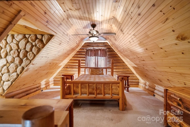 1154 Woodrow Pl, Lenoir, NC 28645 - unfurnished bedroom with rustic walls, wood ceiling, carpet floors, and vaulted ceiling