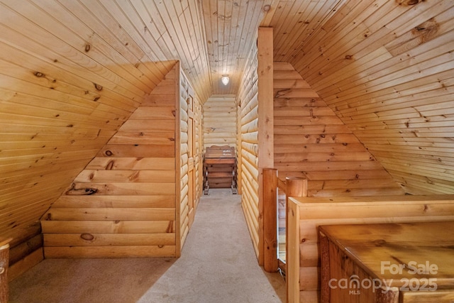 1154 Woodrow Pl, Lenoir, NC 28645 - additional living space featuring wood ceiling, vaulted ceiling, log walls, and carpet