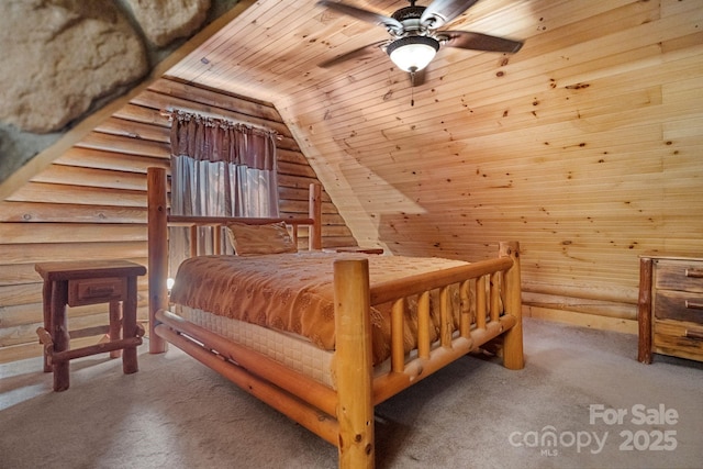 1154 Woodrow Pl, Lenoir, NC 28645 - bedroom featuring wood ceiling, carpet floors, vaulted ceiling, and wooden walls