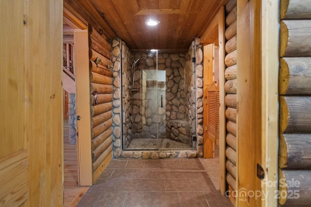 1154 Woodrow Pl, Lenoir, NC 28645 - hallway featuring wooden ceiling, rustic walls, and tile patterned flooring