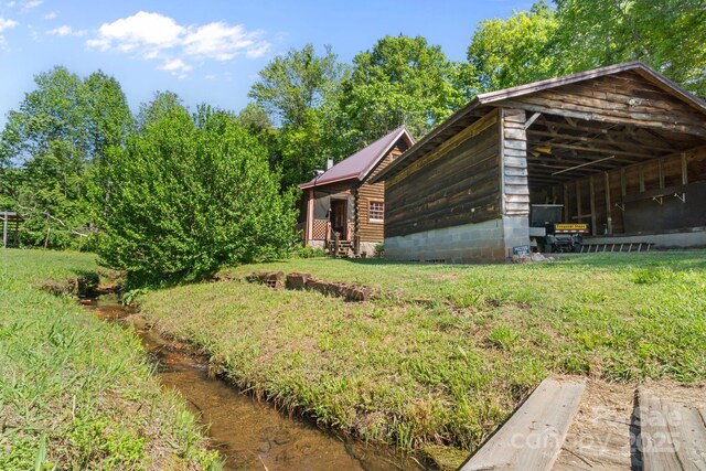 1154 Woodrow Pl, Lenoir, NC 28645 - view of property exterior with a lawn