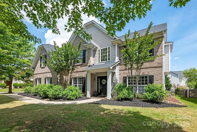 traditional-style house with brick siding