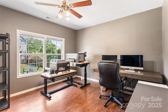 office with ceiling fan, wood finished floors, and baseboards