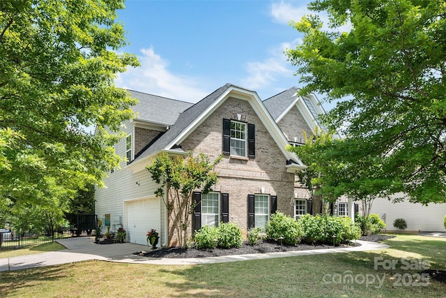 view of front of property with driveway, brick siding, and a shingled roof