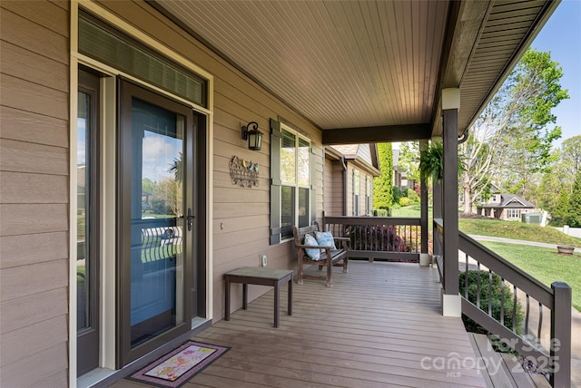 wooden deck with a porch