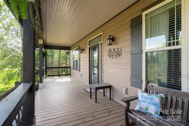 wooden deck with a porch
