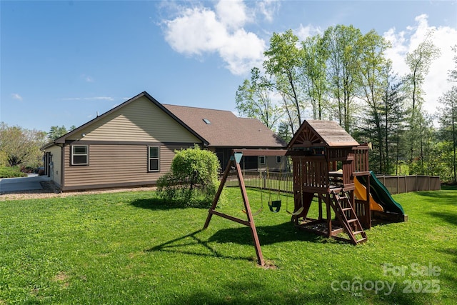 view of jungle gym featuring a yard