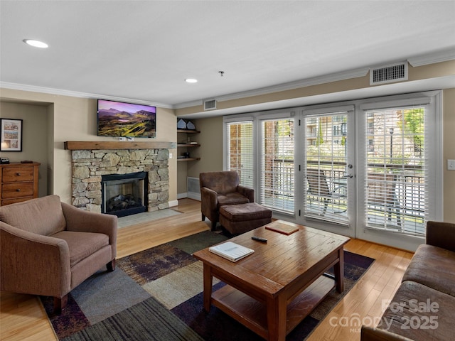 401 Bowling Park Rd, Asheville, NC 28803 - living room featuring crown molding, visible vents, and a healthy amount of sunlight
