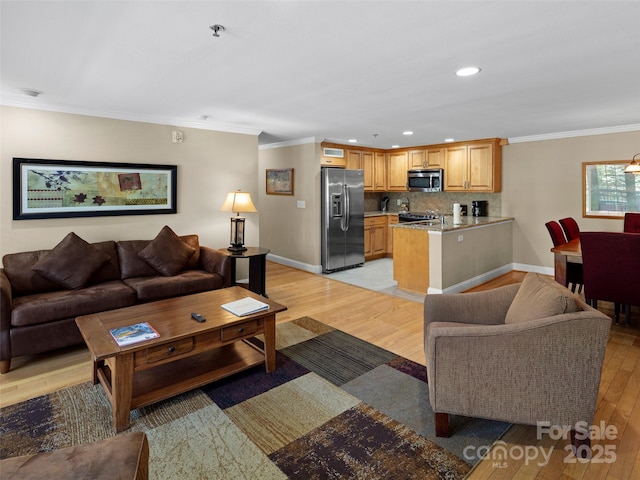 401 Bowling Park Rd, Asheville, NC 28803 - living area with baseboards, crown molding, and light wood finished floors