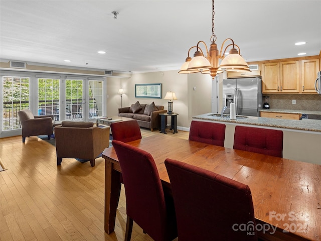 401 Bowling Park Rd, Asheville, NC 28803 - dining area with visible vents, light wood-type flooring, a chandelier, and recessed lighting