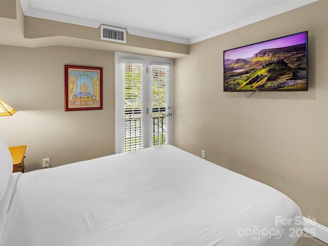 401 Bowling Park Rd, Asheville, NC 28803 - bedroom featuring ornamental molding, visible vents, access to outside, and baseboards