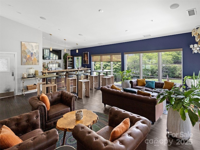 401 Bowling Park Rd, Asheville, NC 28803 - living room featuring visible vents, wood finished floors, and baseboards