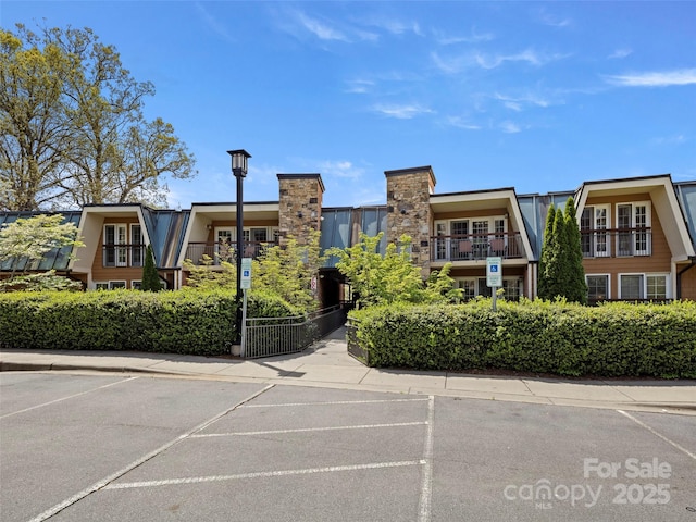 401 Bowling Park Rd, Asheville, NC 28803 - view of building exterior featuring uncovered parking