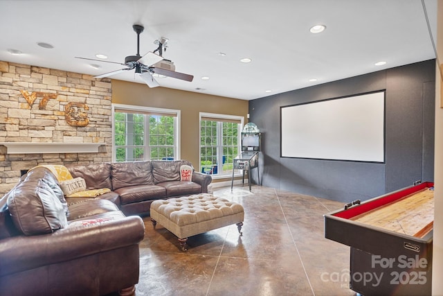 7471 Barfield Ln, Denver, NC 28037 - cinema with concrete floors, ceiling fan, recessed lighting, and a fireplace